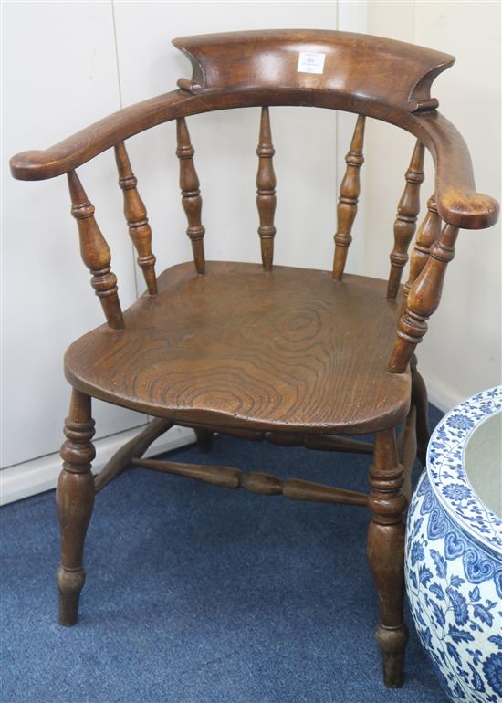 A Victorian elm and beech captains chair,